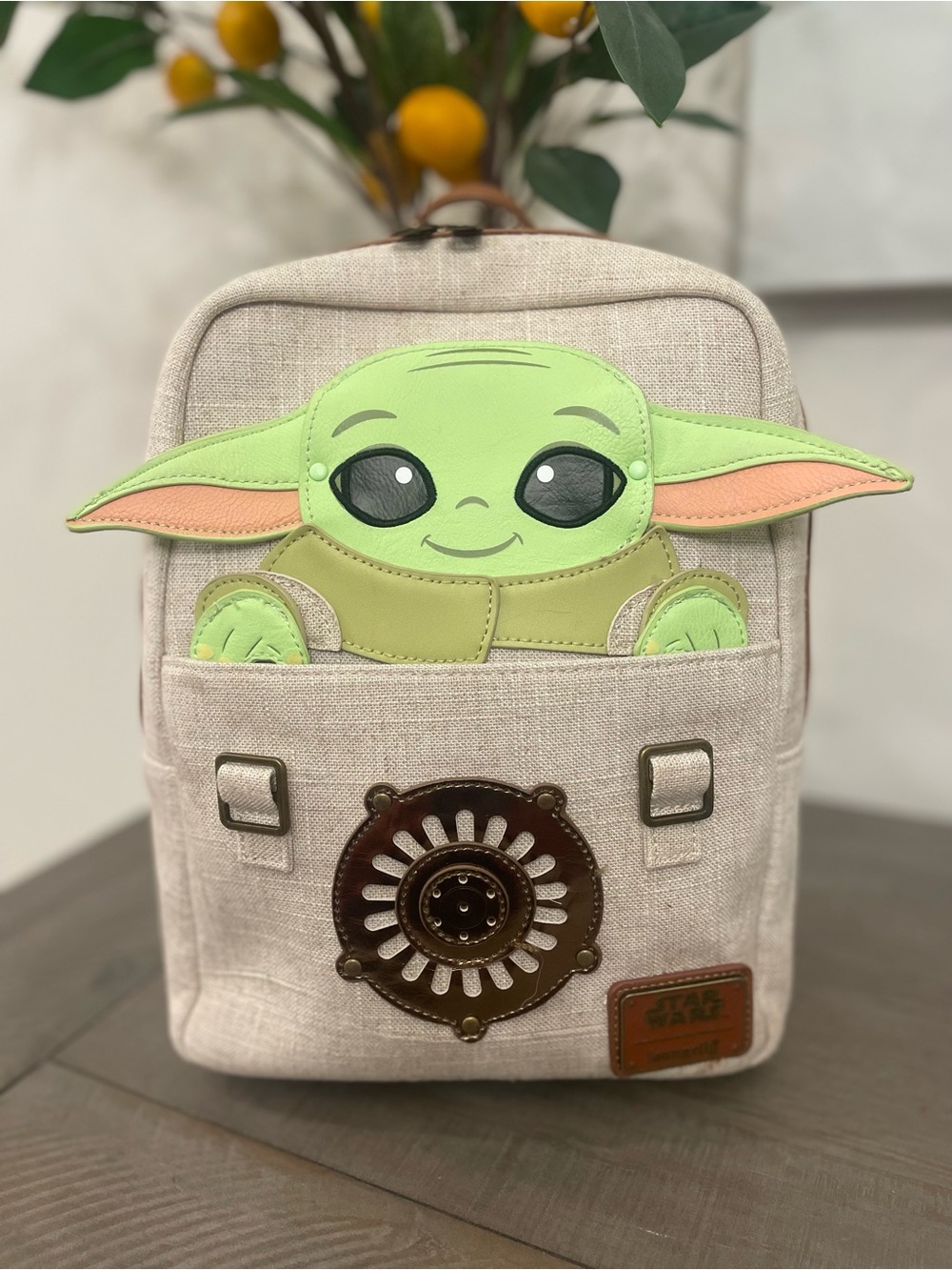 Loungefly Beige Mini Backpack with Green Baby Yoda Face Accent
